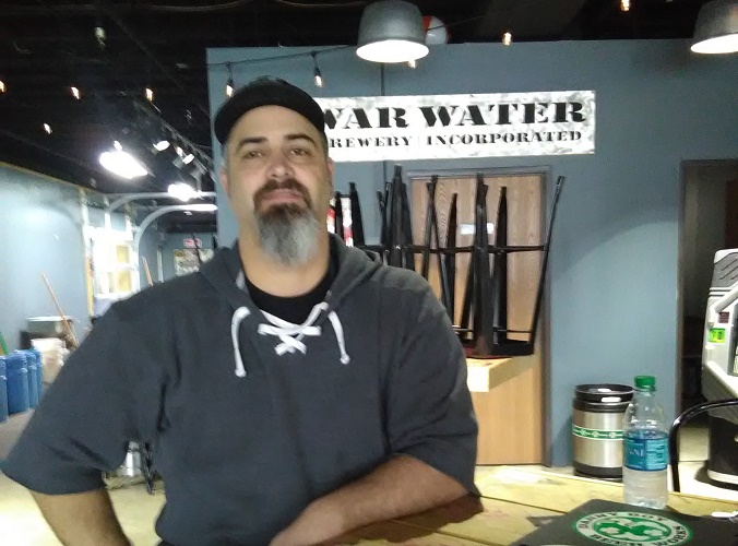 ris Paul talks about growth at Riverview Plaza from War Water Brewery.