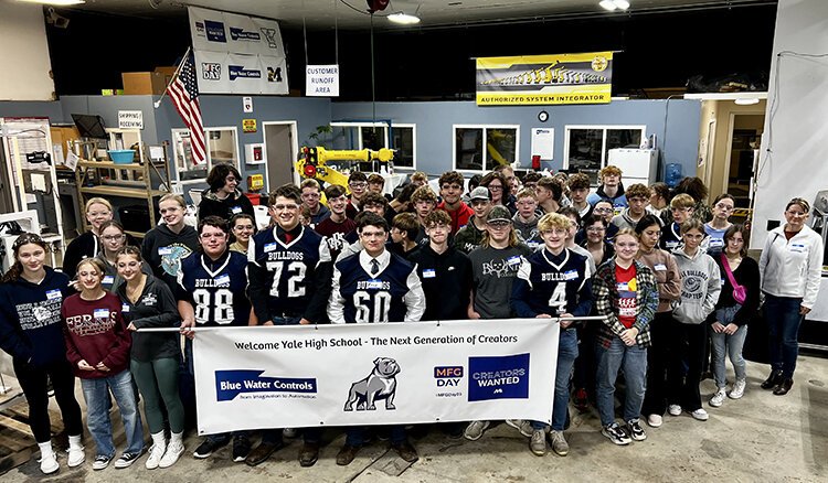 Yale High School students pose for a photo during Manufacturing Day on Oct. 19, 2023.