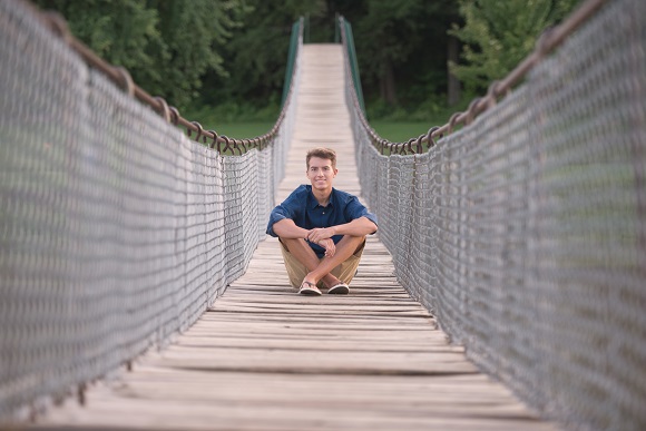 Hanging out on the bridge is not the ordinary senior photo style