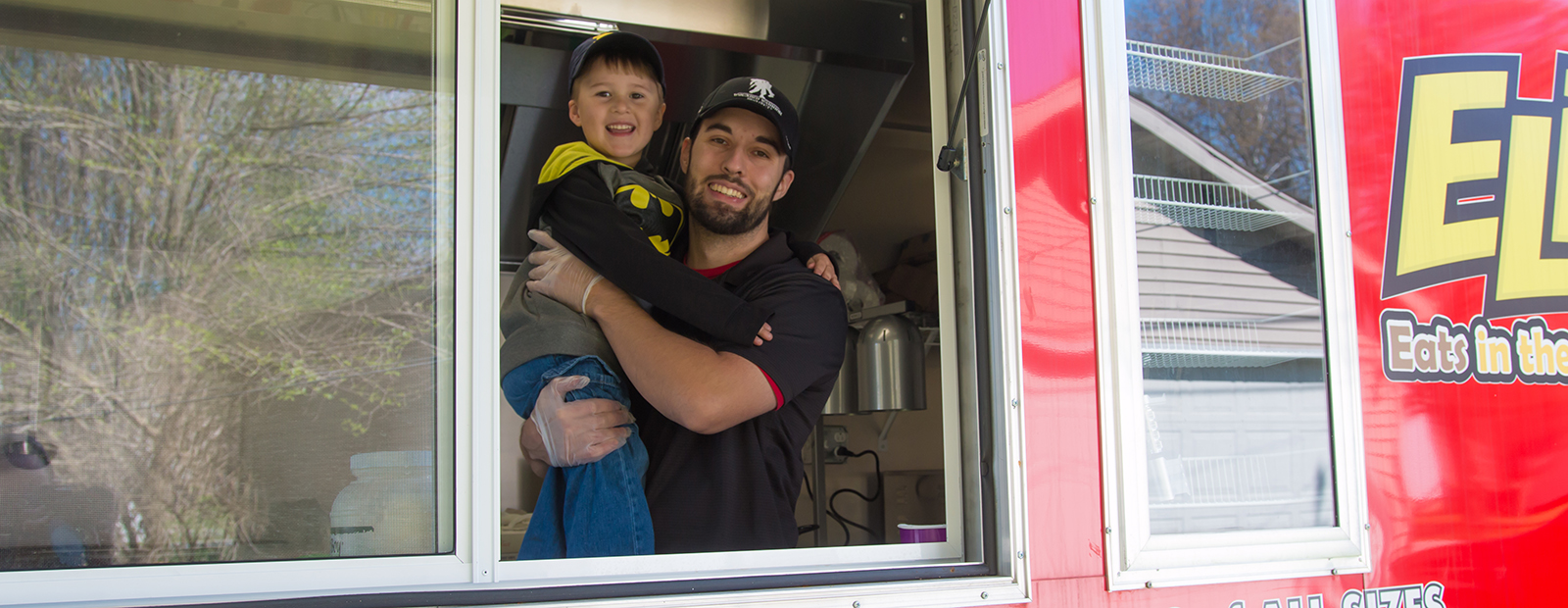 Gary Lokers and son, Eli, ready to roll in the food truck.