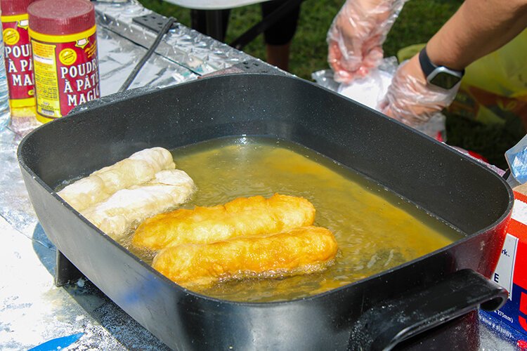 Traditional Native American fry bread is made fresh to order for attendees at the Blue Water Traditional Pow-Wow. 