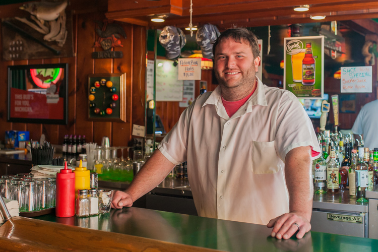 Kurt Slota is ready to serve up great burgers at his bar in Casco.
