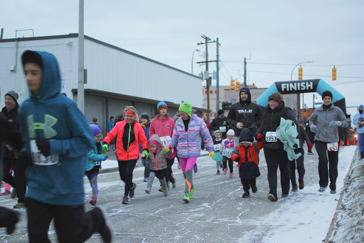 A snowy start to the Kid’s Mile, the first event at the Poho Hot Cocoa Run on Jan. 29. 