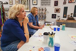 Local artists Tara Hutton (left) and SK Mabry participate in Mary's Color Theory III Class held at New Century Art Gallery in Marine City.