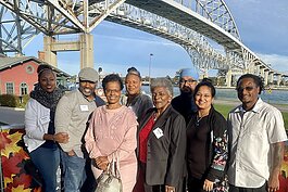 Guests pose for a photo at the Blue Water Convention Center in Port Huron during the Minority Philanthropy Initiative giving circle event in 2021.