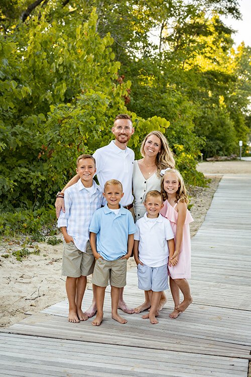 Riley Alley with her husband, Matt, and their four children.