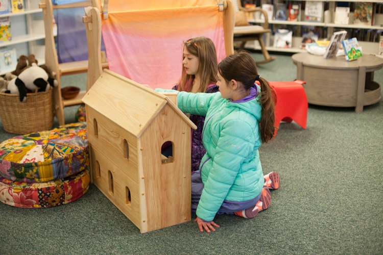 Hayley Mills (9) and Zoey Mills (7) Enjoying the doll house at the Port Huron Public Library. They frequent the Library every few weeks. They are big into reading and playing with the fun activities at the library. 
