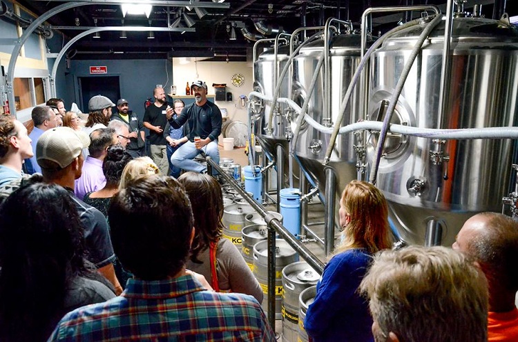 Kris Paul, founder of War Water Brewery, took the group on a tour of his operation while sharing his