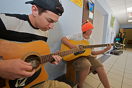 Kids in the MFAK program learn instruments