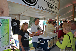 Chocolay River brewers talk to customers at the U.P. Beer Fest.