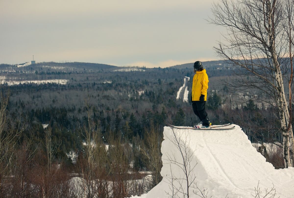 A skier overlooks the Upper Peninsula horizon in "Lake Effect."
