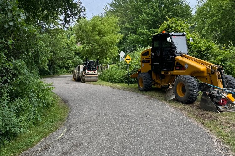 Restoration work on the Frank N. Anderson Nature Trail removed tree branches that had pushed bumps into the paved pathway. 