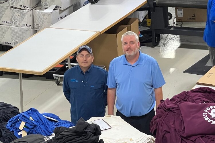 John Gillman, at left, and Operations Manager Bill Coppens, right, work together to make ATS Printing a preferred employer.