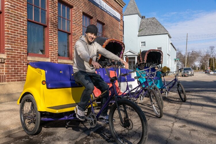 Cory Christopher opened Bayside Buggies this spring, offering downtown shoppers and diners open-air rides around the district.