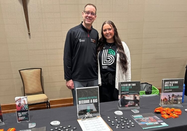 Big Brothers/Big Sisters of the Great Lakes Bay Region set up an informational table at a recent Bay Area Chamber of Commerce Eye Opener Breakfast.