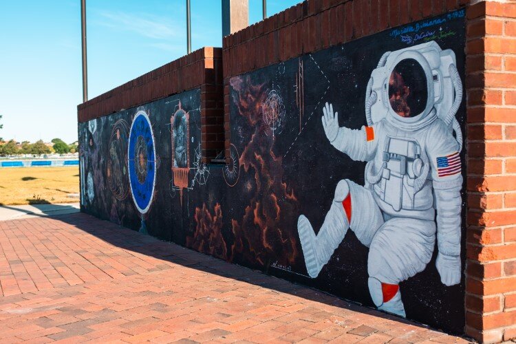 Studio 23 helped create murals that fill Wenonah Park with art and color. 