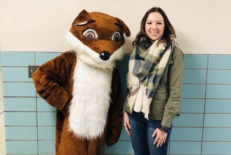 Cierra Hessbrook, from Bay Area Women's Center, poses with Felix the Friendly Fox. Felix is the center’s body safety mascot who helps educate students about consent and boundaries.