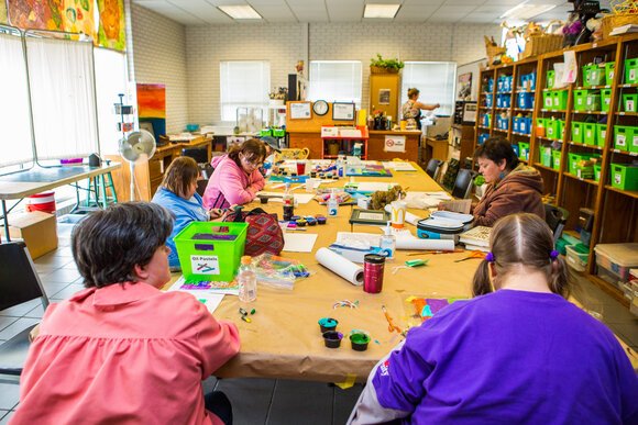 At Do-Art in downtown Bay City, participants learn about famous painters and other artists. They practice techniques to polish their work. Some students take visual adventures in weaving or paper art. Others focus on chalk and acrylics.