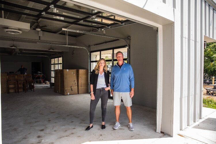 Local entrepreneurs Jenifer Acosta and Dave Dittenber partnered to turn a long-empty building on the Saginaw River into a beer garden and food truck park. 