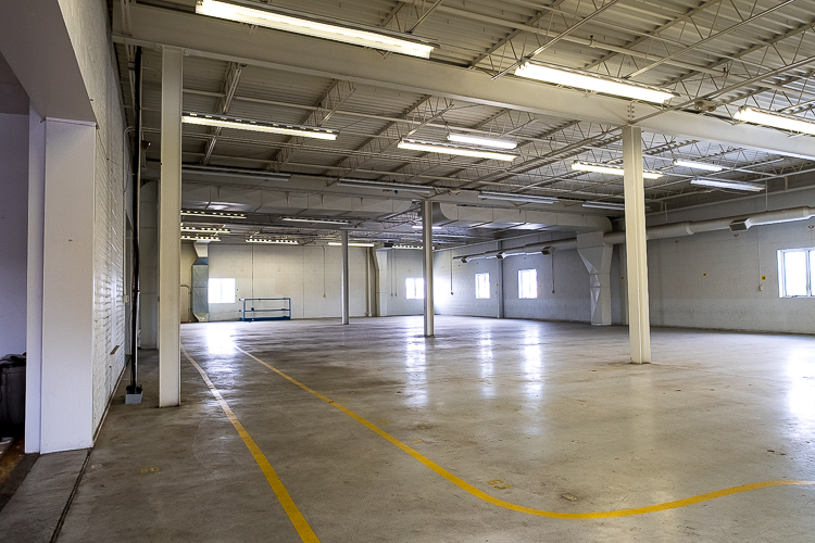 The warehouse interior has served as the destination for Hell’s Half Mile music events, working spaces for local nonprofits, and 30,000 square feet of storage space for car fanatics’ summer rides