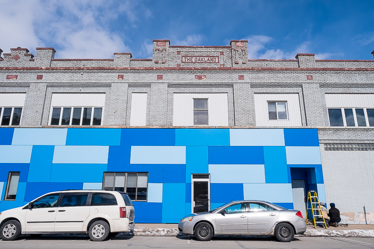 The new facade is created by using a series of stained tiles. 