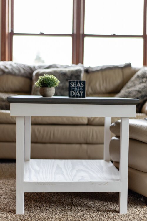 Johnston’s style varies depending on the client’s needs. While some tables he creates focus on showing natural wood grain, others, like this table in his living room, are painted to provide a more polished feel. 