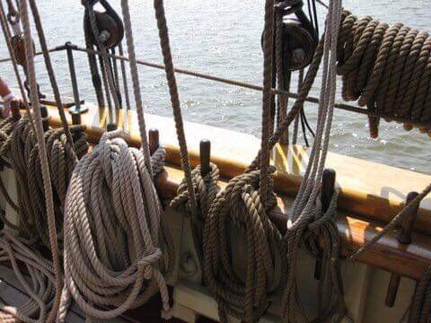The 2019 Tall Ship Celebration yarn is based on this photo from the inside of a ship. She says the 2019 yarn will feature shades of black, blue, brown, and cream.