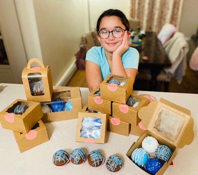 Kinsley Navarro, 10, started making hot cocoa bombs for fun in November. Now, she has a business and will be selling her chocolatey concoctions downtown.