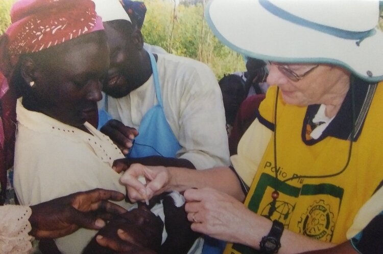 Nancy Cusick, a retired nurse, has been involved with Rotary International's program to eradicate polio for more than 20 years. (Photo courtesy of Chuck and Nancy Cusick)