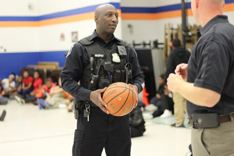 Bay City Police Officer Brandon Murphy is active in Bridge the Gap events.