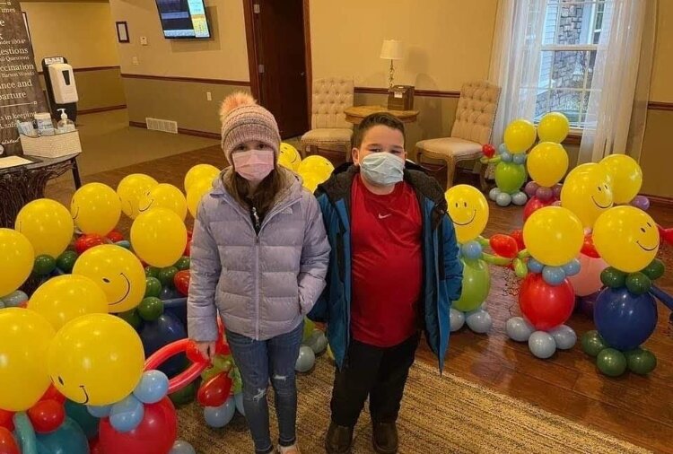Elementary school students delivered 'Balloon Buddies' to brighten the days of senior citizens in the region.
