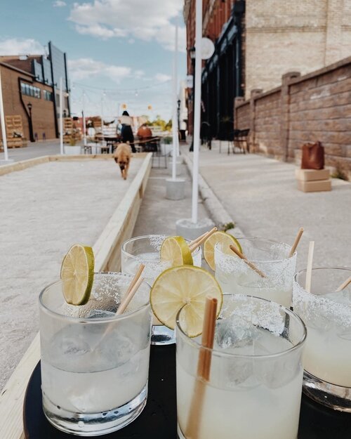 Businesses along Center Avenue, Saginaw Street, Third Street, and Adams Street decorated the spaces, bringing in plants and games. The Public House added a bocce ball court.