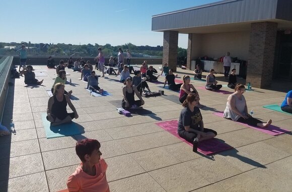 The RAC, an athleisure clothing boutique that opened in Uptown Bay City last fall, is hosting rooftop yoga on July 20.