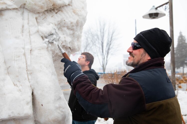 Sean Gallagher, an instructor at Studio 23/The Arts Center and an art teacher at Unionville-Sebewaing Area High School, works on a sculpture.