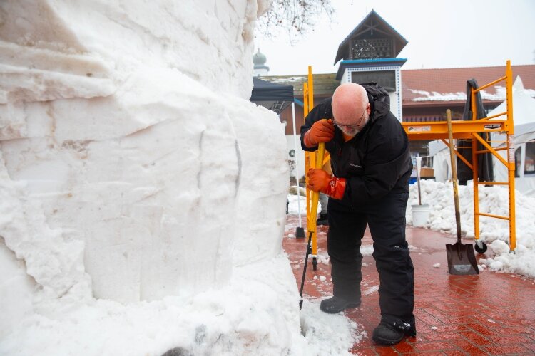 Tom Gillman, a Bay City native, carves with chainsaws all year. Every winter, though, he uses hand tools to carve snow..