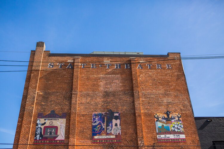 Murals exist in unexpected places, such as the back of a landmark theater.