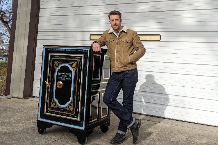 Justin Stilson's hand painted this safe from the 1870s, restoring its beauty.