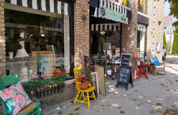 Striped Canopy is a furniture and home décor consignment store, featuring a furniture painting workshop in the back.