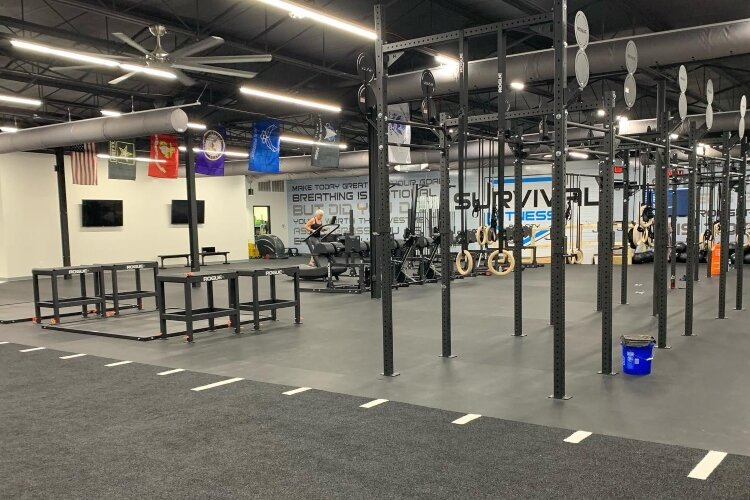 Survival Fitness moved into a much-larger space to accommodate more classes, but the owner still pledges to maintain the small-community atmosphere.