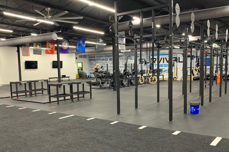 Survival Fitness moved into a much-larger space to accommodate more classes, but the owner still pledges to maintain the small-community atmosphere.