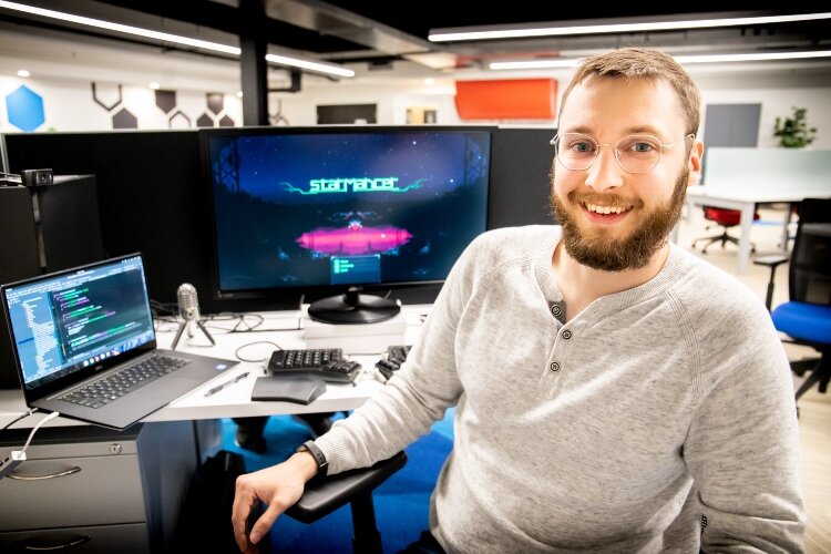 After four years of working to build a new video game, Starmancer, Tyler Millershaski celebrates that independent game developer and publisher Chucklefish plans to release it to the public later this year.