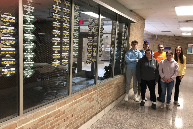 Students sold paper footballs before the UM-MSU face-off earlier this month. The sales showed the University of Michigan to be the favorite while raising over $100 for MDA.