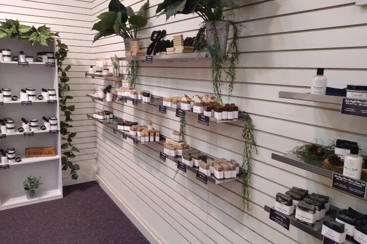 Soaps, lotions, balms, and teas fill the shelves at Essentially Unique.