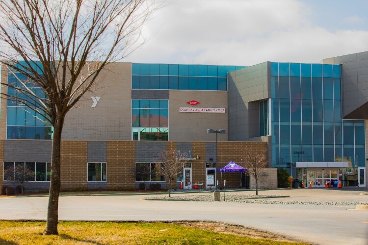 The Dow Bay Area Family Y is closed, but offering the food boxes in its parking lot.