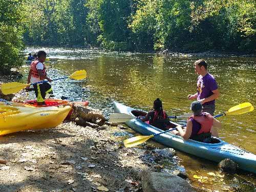 Paddlers on the Huron River Water Trail. Photo by Elizabeth Riggs.