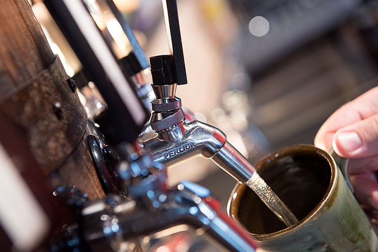 Pouring beer at Bad Brewing - Photo Dave Trumpie