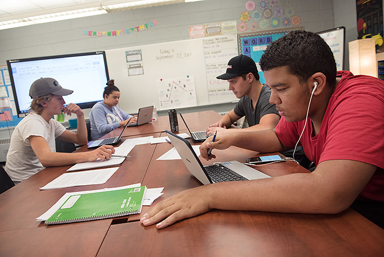 Growing grades, plants, and tending to goats at Blended Academies