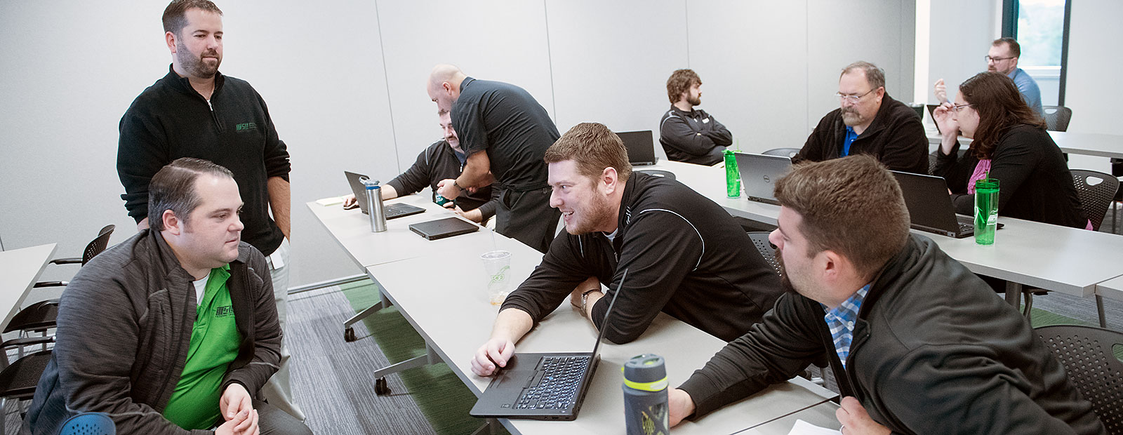 IT staff at work at MSUFCU - Photo Dave Trumpie