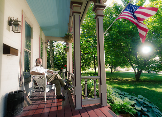 Barry LaRue outside his Oak Street home