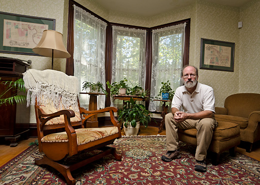 Barry LaRue inside his Oak Street home